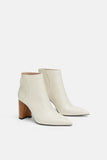 LEATHER ANKLE BOOTS WITH WOOD-EFFECT HEELS