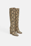 SNAKESKIN PRINT HEELED BOOTS