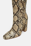 SNAKESKIN PRINT HEELED BOOTS